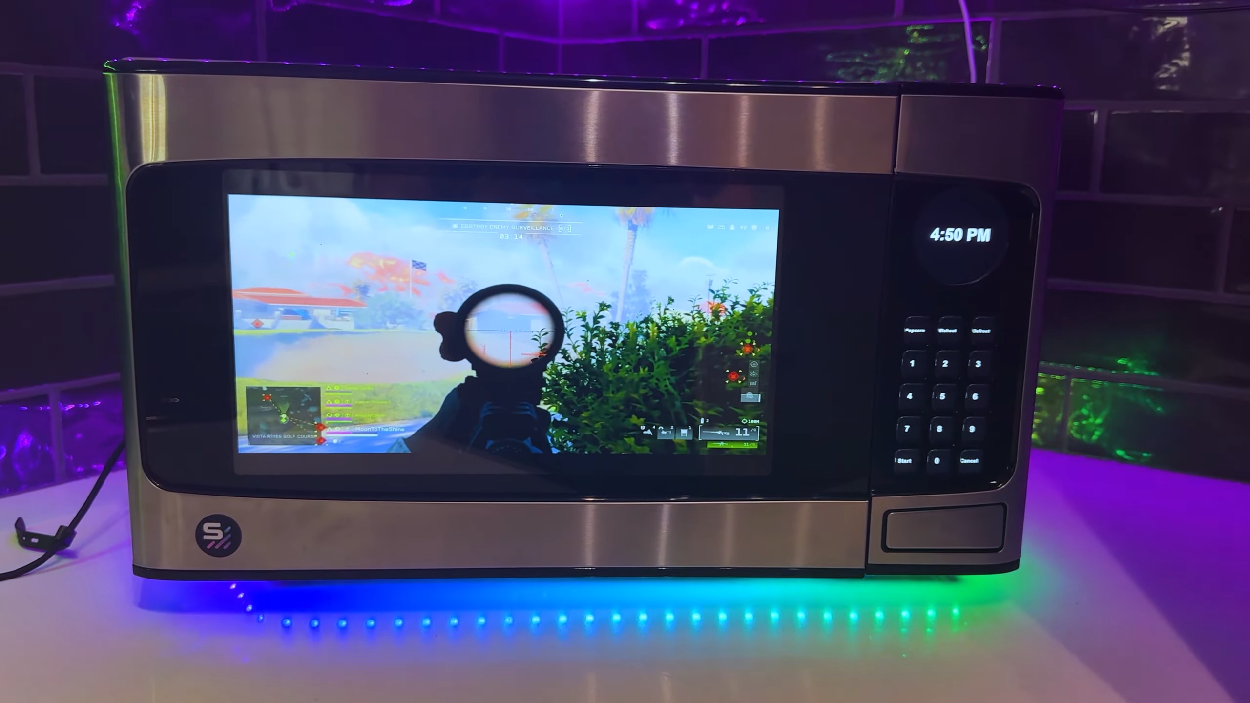 Ця мікрохвильовка “готує” ігри: NVIDIA RTX 5060 Ti 16 ГБ, Core Ultra 5 225 та вбудований екран